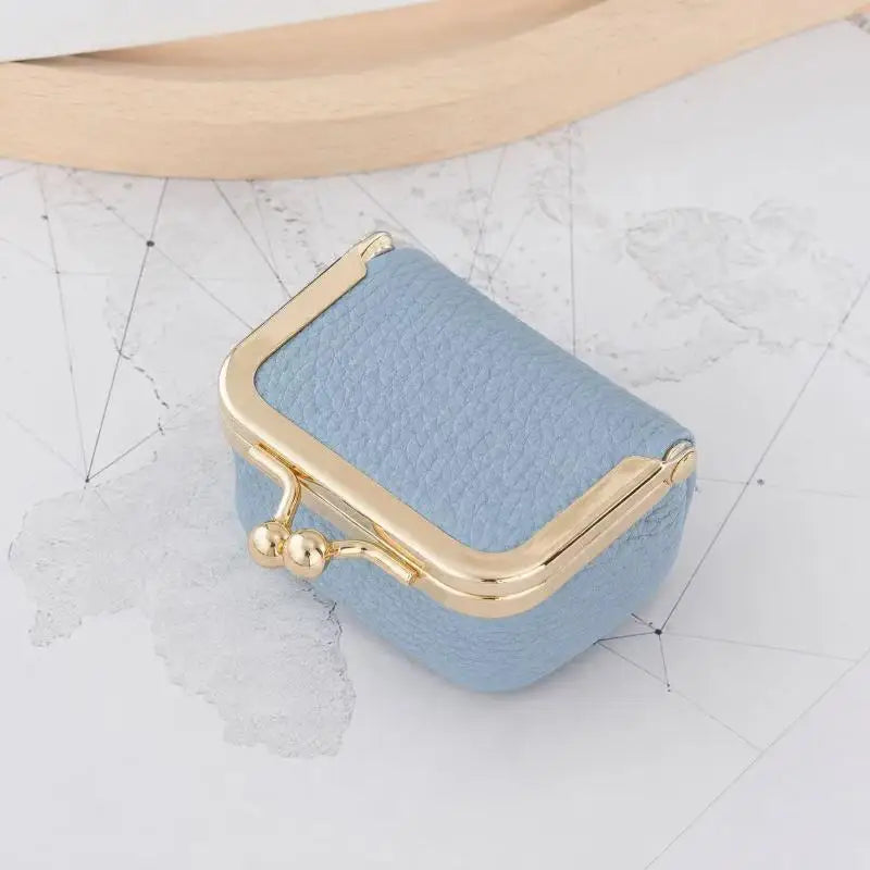 Pochette de voyage Simone - Pochette de voyage Simone ouverte montrant son interieur a pois - Garde Bijoux