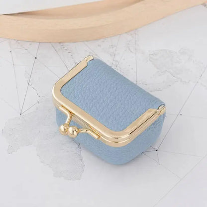 Pochette de voyage Simone - Pochette de voyage Simone ouverte montrant son interieur a pois - Garde Bijoux