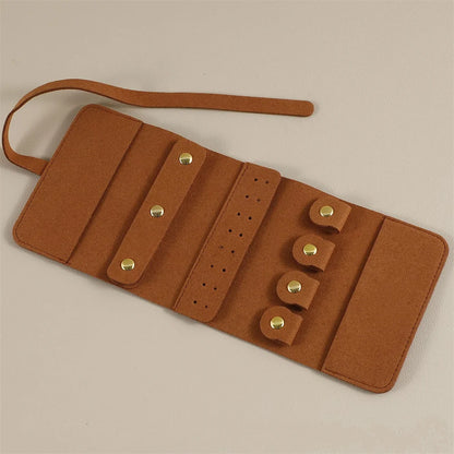 Pochette de voyage Odette - Rouleau à bijoux nomade ouvert à plat sur table - Garde Bijoux
