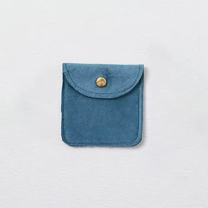 Pochette à bijoux en velours avec fermeture bouton doré