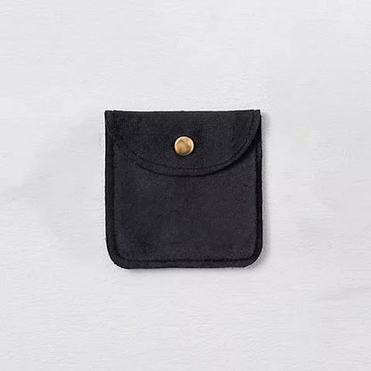Pochette à bijoux en velours avec fermeture bouton doré