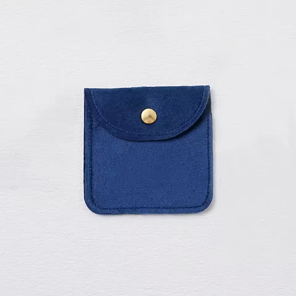 Pochette à bijoux en velours avec fermeture bouton doré