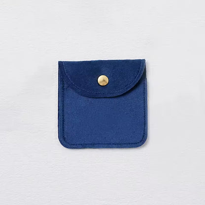 Pochette à bijoux en velours avec fermeture bouton doré