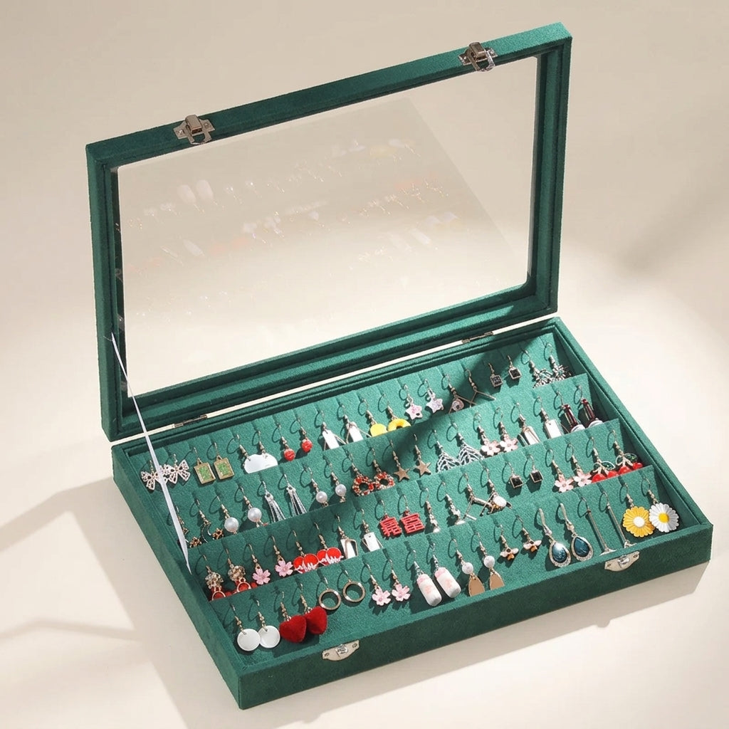 Boîte à boucles d'oreilles verte fonc en velours avec couvercle vitré 64 fentes - Carole