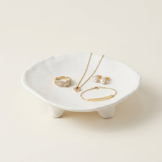 Coupelle à bijoux ronde texturée en céramique avec petit trépied
