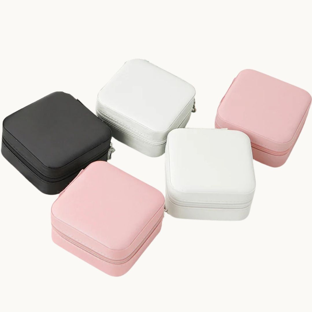 ensemble de boites de voyage en  rose, blanc et noir
