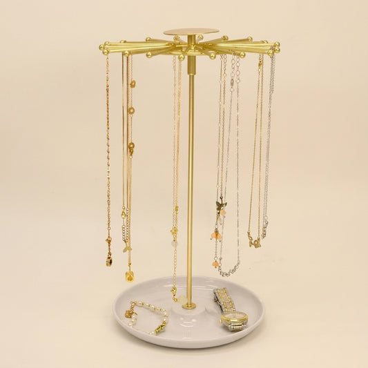 Porte-bijoux rotatif en métal doré avec petit plateau